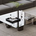 Modern Glass Coffee Table With Black Cylindrical Legs Black Tray Glass Cups Bottle And Magazine