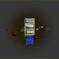 Blue Truck Carrying Colorful Books On Muddy Ground With Street Lamp And Small Plants
