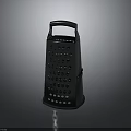 Black Kitchen Grater Appliance Featuring Handle And Perforated Design For Cheese And Vegetables