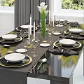 Elegant Dinnerware Set With Calla Lilies Candles Wine Glasses And Plates