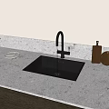 Modern Black Kitchen Faucet with Running Water Over Black Sink and White Marble Countertop