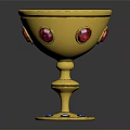Elegant Golden Decorative Cup With Red Gemstones And Blue Stones On Base