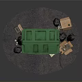 Green Trash Bin With Black Garbage Bags And Open Cardboard Boxes On Ground