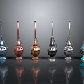 Various Colored Decorative Metal Lanterns With Intricate Designs And Reflections