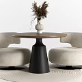 Stylish Round Wooden Table Set with Beige Padded Chairs and White Vase Decor