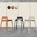 Modern Colorful Bar Stools In Interior Setting With Wall Mounted Decorative Spheres