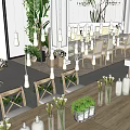 Elegant Restaurant Interior With Wooden Dining Tables White Chairs Green Plants And Chandeliers