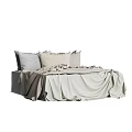 Minimalist Double Bed With Neutral Tones Pillows And Soft Duvet Cover