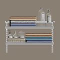 White Two Tier Bathroom Shelf With Light Blue And Beige Folded Towels And Bath Products
