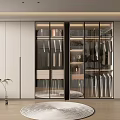 Modern Walk in Closet Interior With Glass Doors Hanging Clothes And Built in Lighting