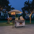 Mobile Coffee Bar Cart With Umbrella In Outdoor Night Setting Decorative Lights And Trees