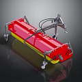 Red And Yellow Mechanical Device With Metal Frame Wheels And Connecting Pipes