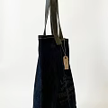 Stylish Dark Blue Canvas Tote Bag Pendant with Leather Handles and Manufacturer Text Label