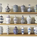 Ceramic Vessels with Traditional Blue and White Patterns and Various Shapes on Wooden Shelves