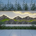 Outdoor Landscape Wall Design With Illuminated Mountain Patterns And Green Plants