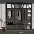 Sleek Modern Wardrobe Interior With Sliding Glass Doors Hanging Garments Folded Clothes And Storage Bags