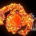 Flaming Silver Sculpture With Bright Orange Fire On Black Background