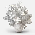 Transparent Vase With Purple And White Lilac Flowers And Green Leaves