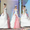 Three Women In White Pink Wedding Dresses Standing Before Colorful Decorated Arch With Clothing