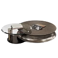 Stylish Round Coffee Table With Glass Top And Metal Base Displaying Magazines On Top