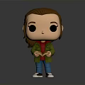 Cartoon Vinyl Figure With Brown Hair Big Eyes Green Jacket And Red Book