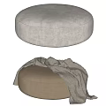 Modern Round Ottoman Design With Beige Fabric And Gray Blanket Accent