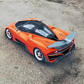 Orange Supercar With Sleek Design Black Roof And Rear Spoiler On Gravel Ground