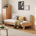 Two Seater Beige Sofa With Wooden Frame Black White Brown Pillows Throw Blanket And Wooden Floor