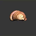 Freshly Baked Golden Flaky Croissant With Shiny Texture On Black Background