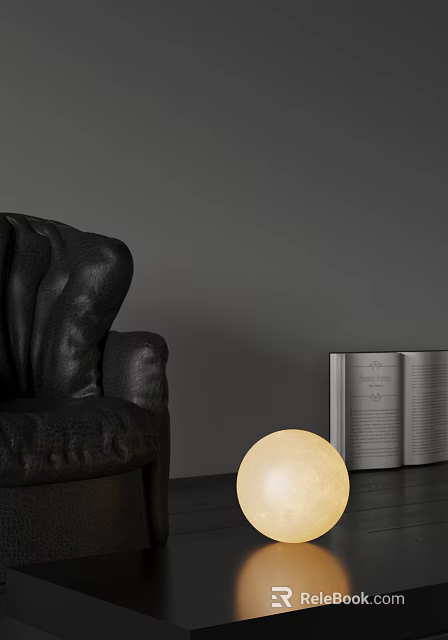 Spherical Table Lamp With Soft Glowing Light Beside Black Leather Sofa And Open Book 3d model 