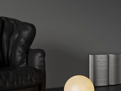 Spherical Table Lamp With Soft Glowing Light Beside Black Leather Sofa And Open Book 3d model
