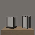 Modern Table Lamps With Black Metal Frame And White Shade On Wooden Table