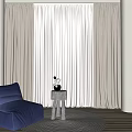 Blue Bean Bag Chair in Living Room with Side Table Decorative Items and Curtains