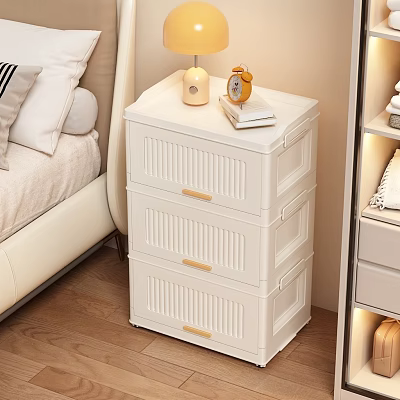 White Three Drawer Nightstand with Golden Handles Table Lamp Alarm Clock and Books in Bedroom 3d model