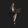 Business Woman In Suit And Skirt Using Laptop While Sitting With Crossed Legs