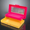 Pink And Yellow Plastic Storage Case With Open Mirror Design And Tray 3d model