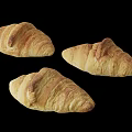 Freshly Baked Croissants Arranged On Modern Coffee Table Against Black Background