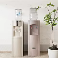 Stylish Two Home Water Dispensers For Daily Use With Green Plant In Indoor Setting