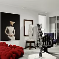 Modern Living Room Interior With Cozy Purple Upholstered Armchair And Artistic Tall Stacked Book