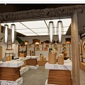 Japanese Style Interior Space With Wooden Elements Marble Countertops Hanging Lanterns And Display Shelves