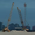 Two Large Construction Cranes Operating In City Skyline With Snowy Ground 3d model