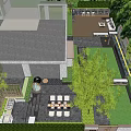 Tranquil Courtyard Garden with Green Lawn Stone Pathway and Outdoor Seating