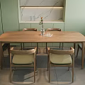 Wooden Dining Table Set With Six Light Green Cushioned Chairs And Marble Shelf Decor