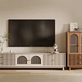 Modern Light Colored TV Stand With Arched Doors Drawers And Decorative Plant Vase