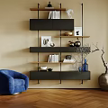 Modern Wall Mounted Black Wooden Shelving with Books Decor in Beige Interior and Blue Armchair