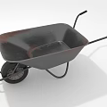 Rusted Metal Garden Wheelbarrow With Black Handles And Single Metal Wheel
