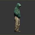 A Man Standing In Green Hooded Jacket Khaki Pants With Hands In Pockets Gray Background
