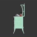 Vintage Green Kitchen Stove with Four Burners Red Kettle Cabinet Doors and Drawer