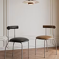 Minimalist Modern Single Chairs With Leather Seats And Metal Frames On Wooden Floor