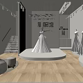 Elegant Bridal Shop Interior Featuring White Wedding Dresses And Mannequin